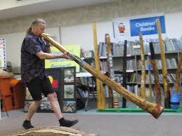 Man playing a digeridoo